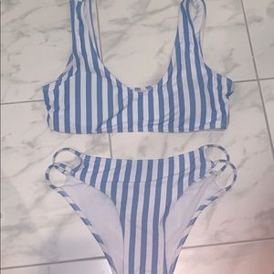 Blue and white striped bathing suit